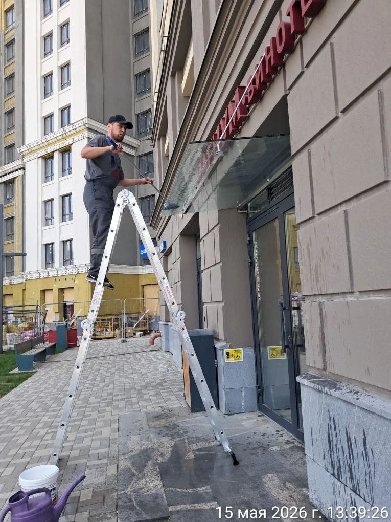 фото мытье козырьков.jpg